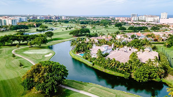 aerial drone shot of Golf course in Boca Raton, Florida with cit